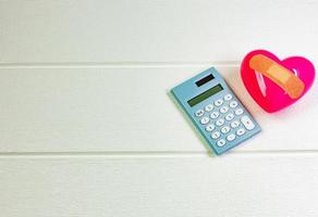 pink Heart on white wood for medical content. photo