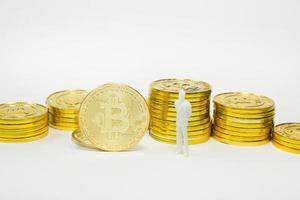 white miniature and gold coin bitcoin abstract image close up background. photo