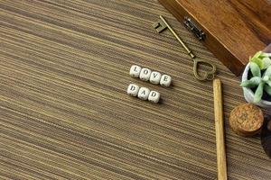 wooden text  for father day content close up image. photo