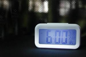 Digital alarm clock  6am close up image. photo