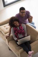african american couple shopping online photo