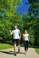 Couple jogging outside photo