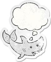 cartoon shark and thought bubble as a distressed worn sticker vector