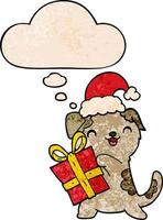 cute cartoon puppy with christmas present and hat and thought bubble in grunge texture pattern style vector