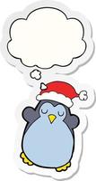 cute christmas penguin and thought bubble as a printed sticker vector