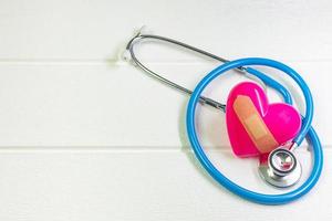 pink Heart and stethoscopes for medical content. photo