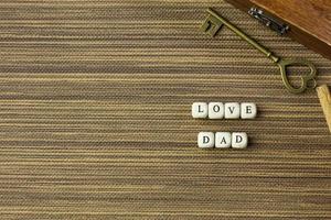 wooden text  for father day content close up image. photo