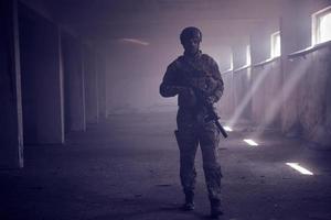 modern warfare soldier in urban environment photo