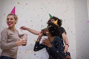 confetti party multiethnic group of people photo