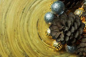 christmas ball and Pine cones  on wood  background. photo