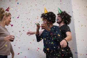 confetti party multiethnic group of people photo