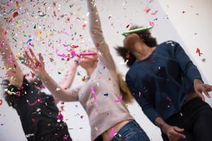 confetti party multiethnic group of people photo