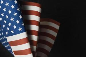 The Veterans Day  concept united states of America flag on black background. photo