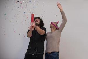 romantic young  couple celebrating  party with confetti photo