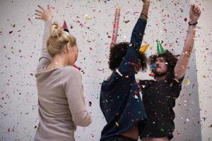 confetti party multiethnic group of people photo