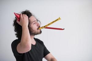 retrato, de, un, hombre, en, sombrero del partido, soplar, en, silbato foto