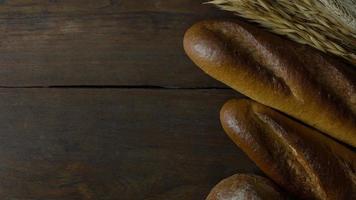 Bread  Wheat oats on wood  image background. photo