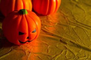 The halloween pumpkin jack in gold holiday background image. photo