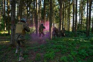 Modern warfare Soldiers  Squad  in battle photo