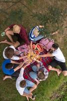 top view of group friends enjoying picnic time photo