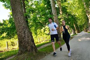 Young couple jogging photo