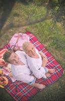 top view of couple enjoying picnic time photo