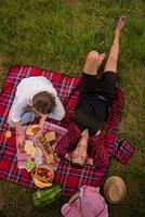 top view of couple enjoying picnic time photo
