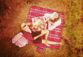 top view of couple enjoying picnic time photo