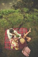 top view of couple enjoying picnic time photo