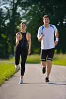 Young couple jogging photo