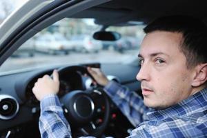 man using car navigation photo