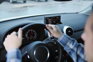 man using car navigation photo