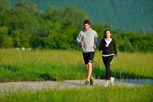 Young couple jogging photo