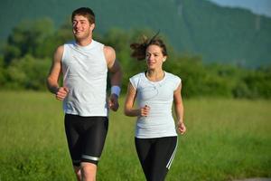 Young couple jogging photo