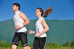 Couple jogging outside photo