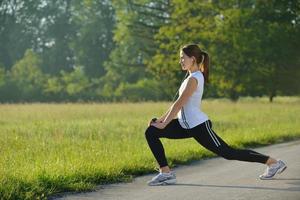 woman stretching before fitness photo