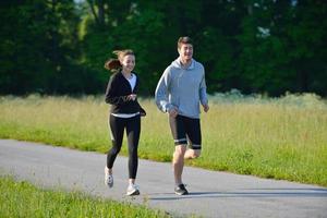 Young couple jogging photo