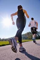 Young couple jogging photo