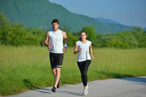 Couple jogging outside photo