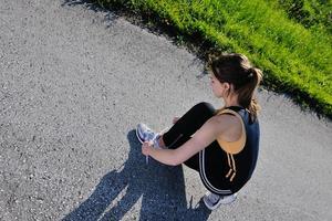 Young beautiful  woman jogging photo