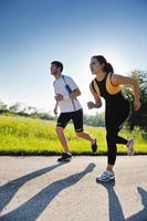 Young couple jogging photo