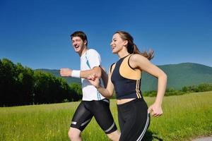 Young couple jogging photo