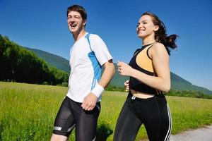 Young couple jogging photo