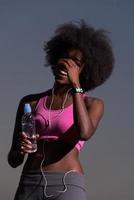 african american woman jogging in nature photo
