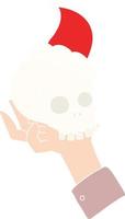 flat color illustration of a hand holding skull wearing santa hat vector