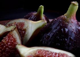 Figs are whole and cut into pieces. photo