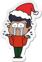 sticker cartoon of a crying man wearing santa hat vector