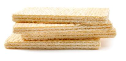 Several crisp waffles are isolated on a white background. photo