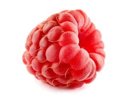 Ripe raspberry berry is isolated on a white background. Full clipping path. photo