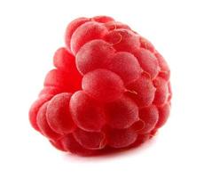 The delicious ripe raspberry berry is isolated on a white background. Delicious raspberries. Full clipping path. photo